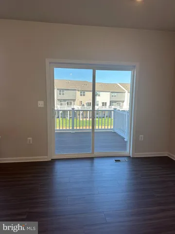 a view of room with wooden floor and floor