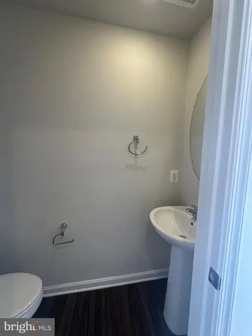 a bathroom with a sink and toilet