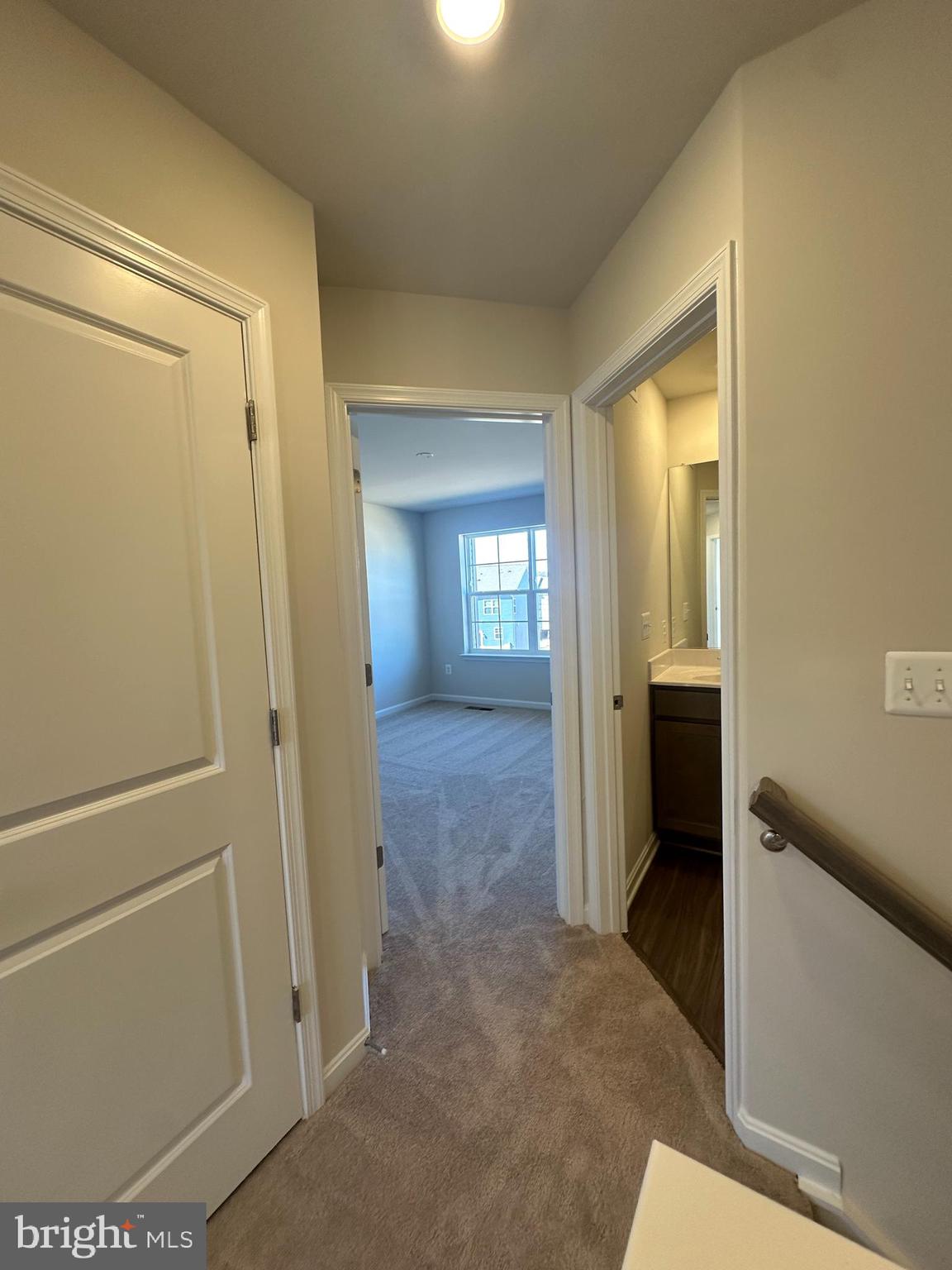 149 Telluride Way Charles Town, WV 25414 - Photo 24 of 39 a view of a hallway with wooden shelves