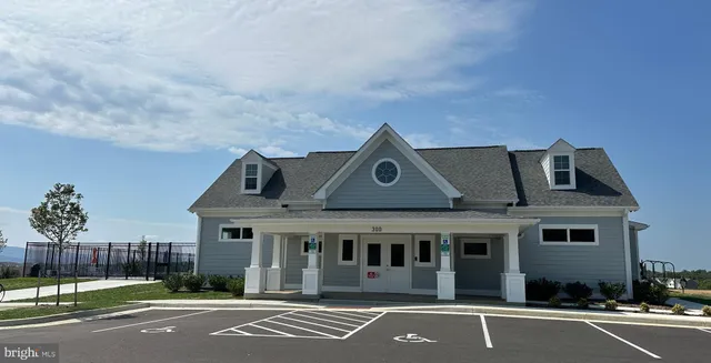 an outdoor sitting area with furniture