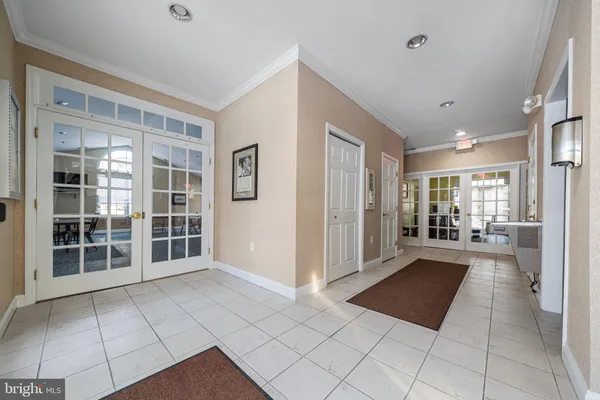 a view of a hallway with windows
