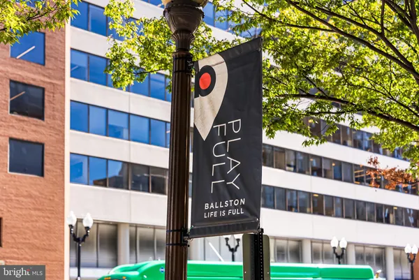 a street sign on a pole on a street