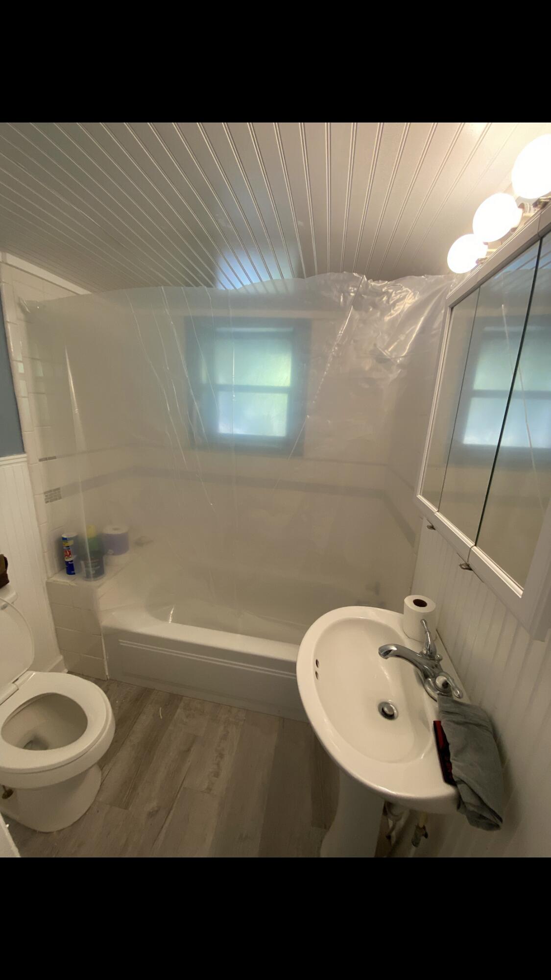5333 Old River Road Baker, FL 32531 - Photo 6 of 12 a bathroom with a sink toilet and shower