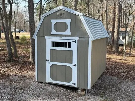 a house with trees in front of it