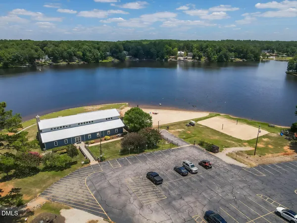 a view of a lake with a yard
