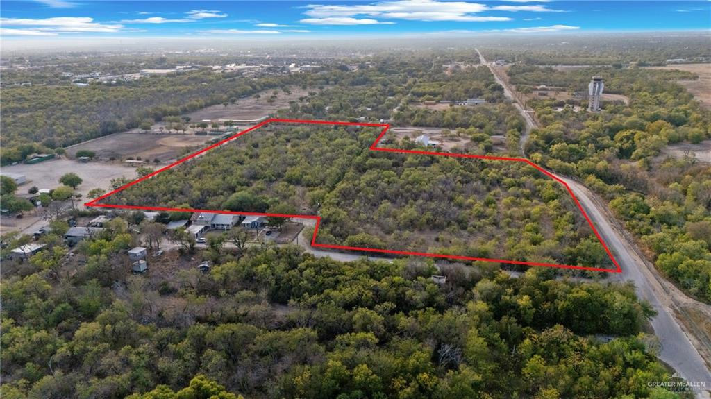 1706 East Ashley Road San Antonio, TX 78214 - Photo 12 of 16 Expansive land parcel featuring dense tree coverage, a defined perimeter, and direct road access