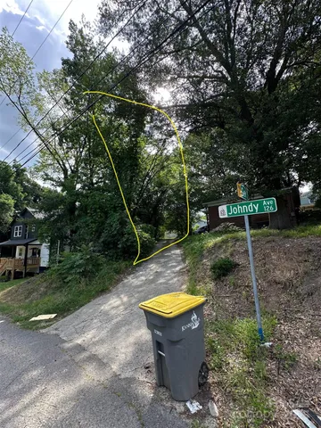 a view of swimming pool with a yard