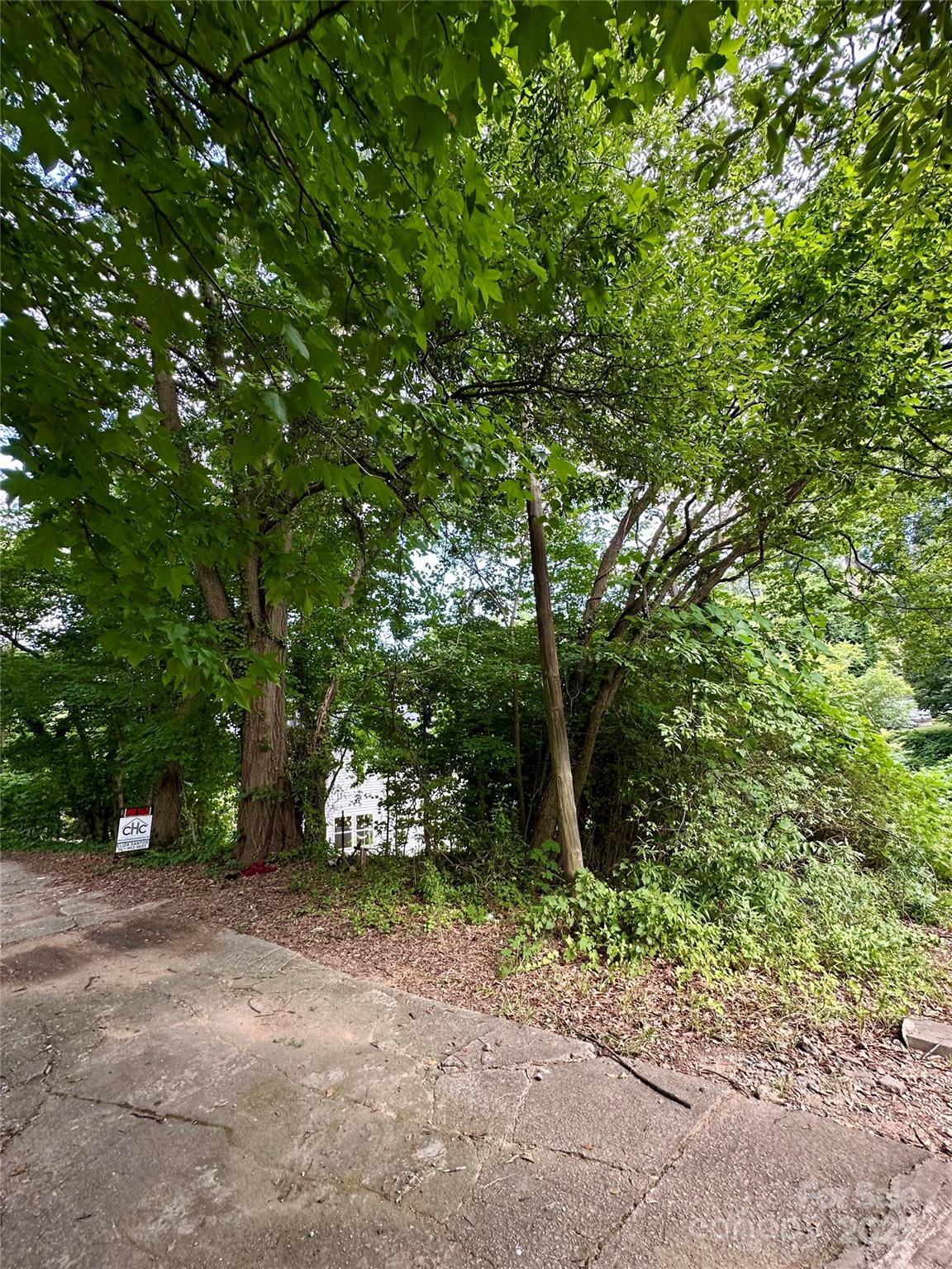 704 Gem Street, Unit 17 Kannapolis, NC 28083 - Photo 9 of 10 a backyard of a house with lots of green space