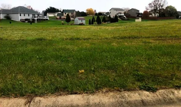 a view of a house with a big yard