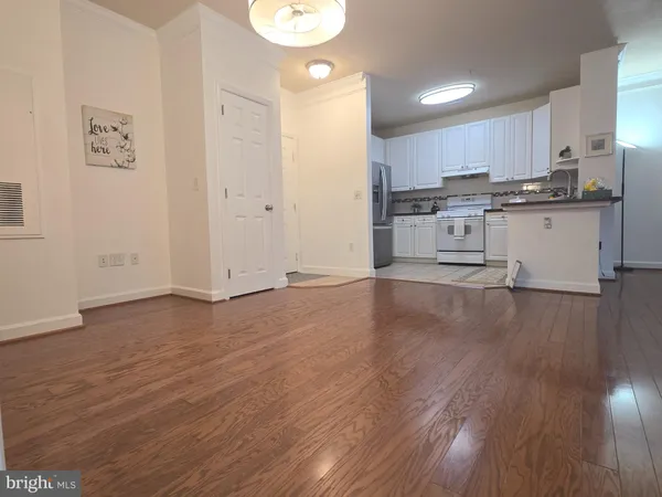 a view of kitchen with wooden floor