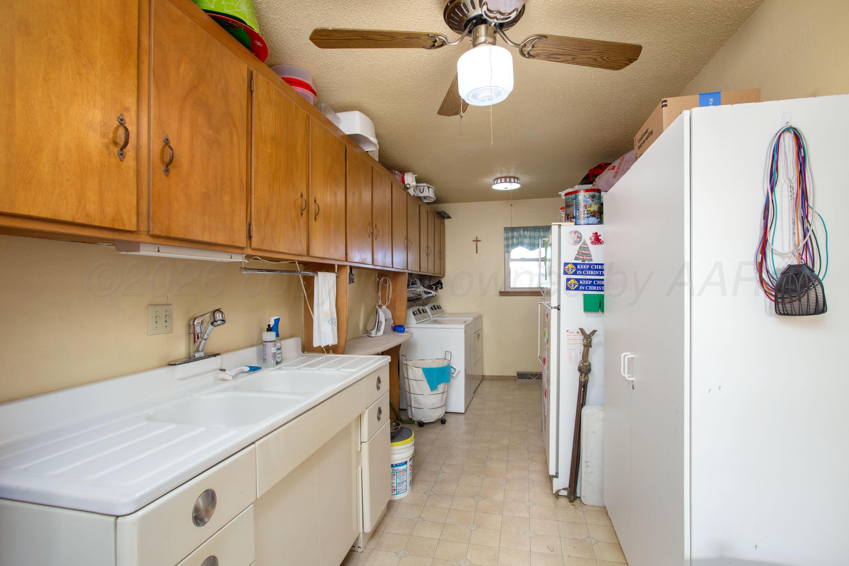 5003 Klinke Road Amarillo, TX 79108 - Photo 17 of 35 Huge utility space with tons of storage