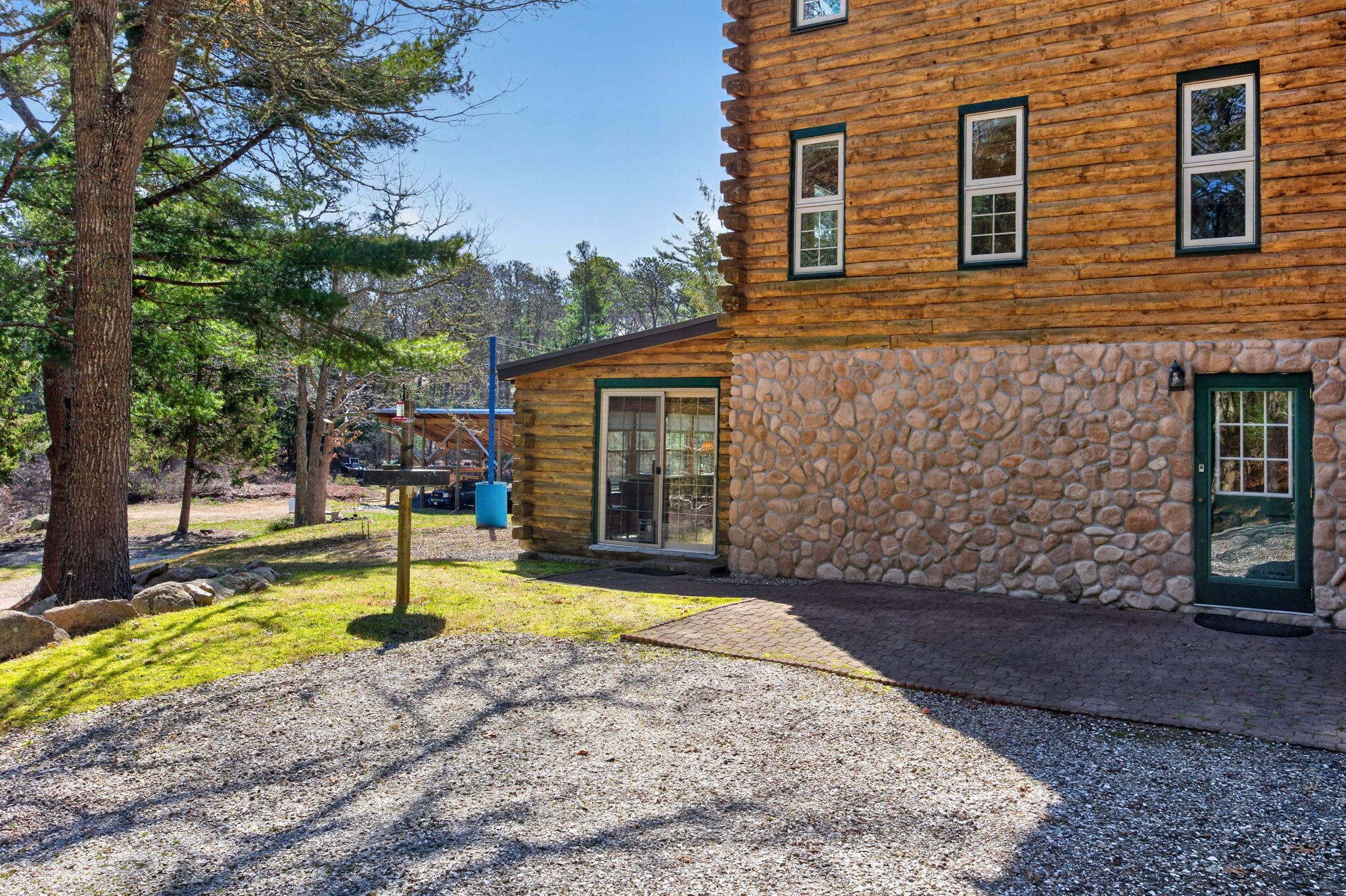 73 County Road Bourne, MA 02532 - Photo 60 of 91 a front view of a house with a yard