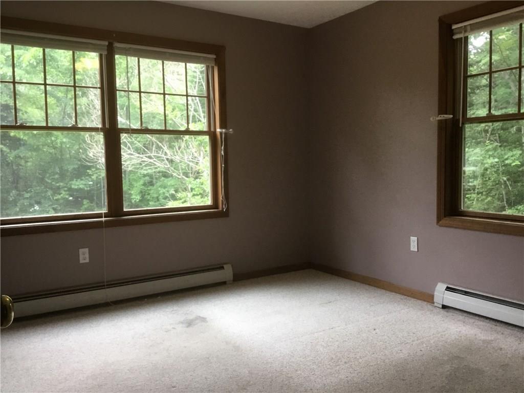 504 Foreside Road Topsham, ME 04086 - Photo 26 of 33 1st Floor Bedroom looking out onto...