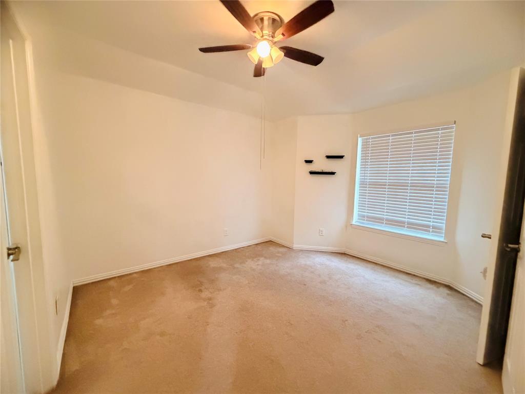434 Moonlight Way Irving, TX 75063 - Photo 20 of 29 a view of an empty room with a window