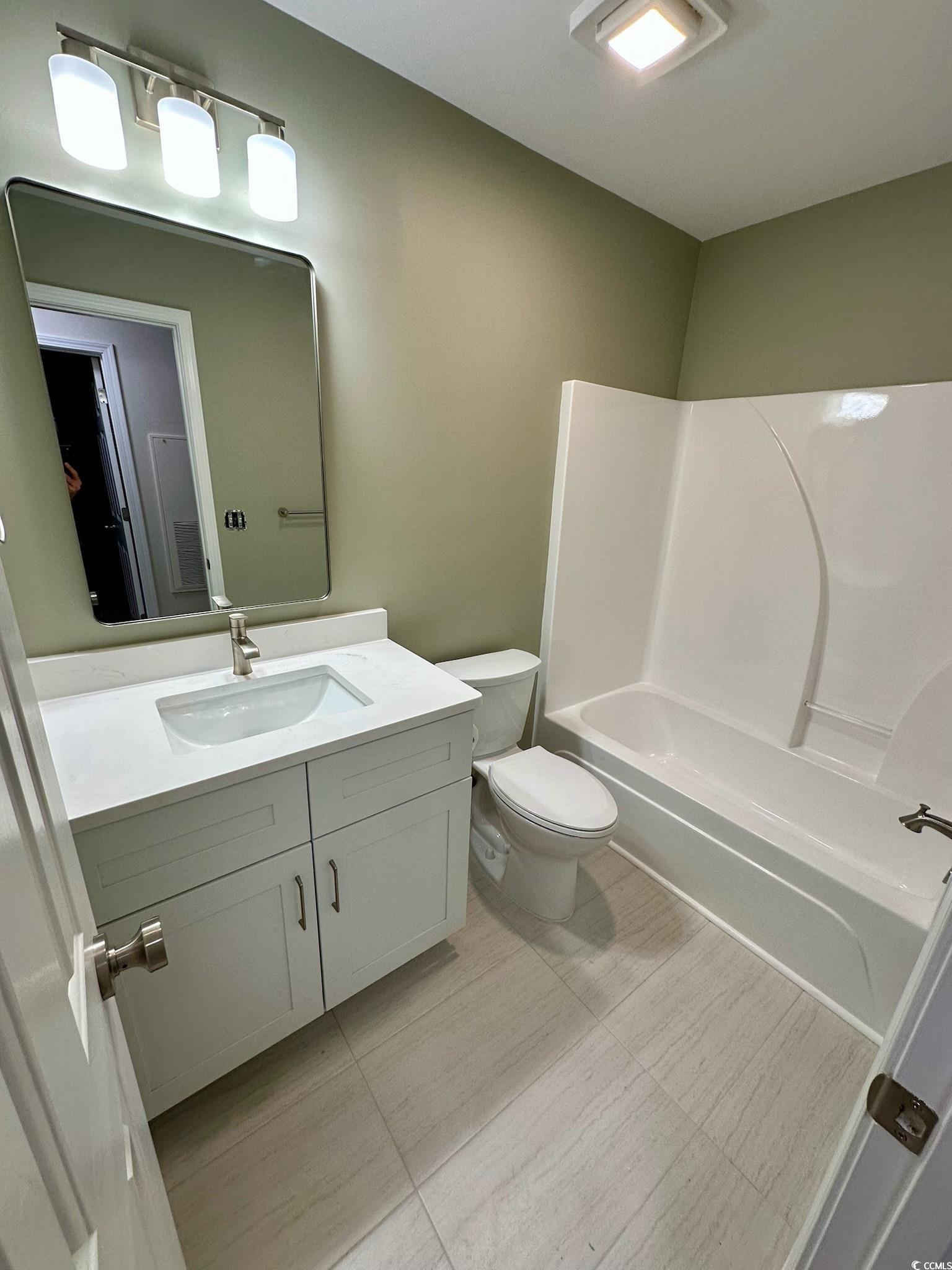 9 Pistachio Loop, Unit D Murrells Inlet, SC 29576 - Photo 17 of 21 Full bath featuring vanity and shower / bathtub combination