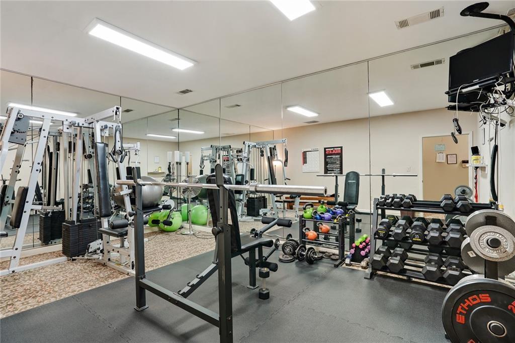 3203 Lenox Road Northeast, Unit 6 Atlanta, GA 30324 - Photo 25 of 27 a view of a room with gym equipment