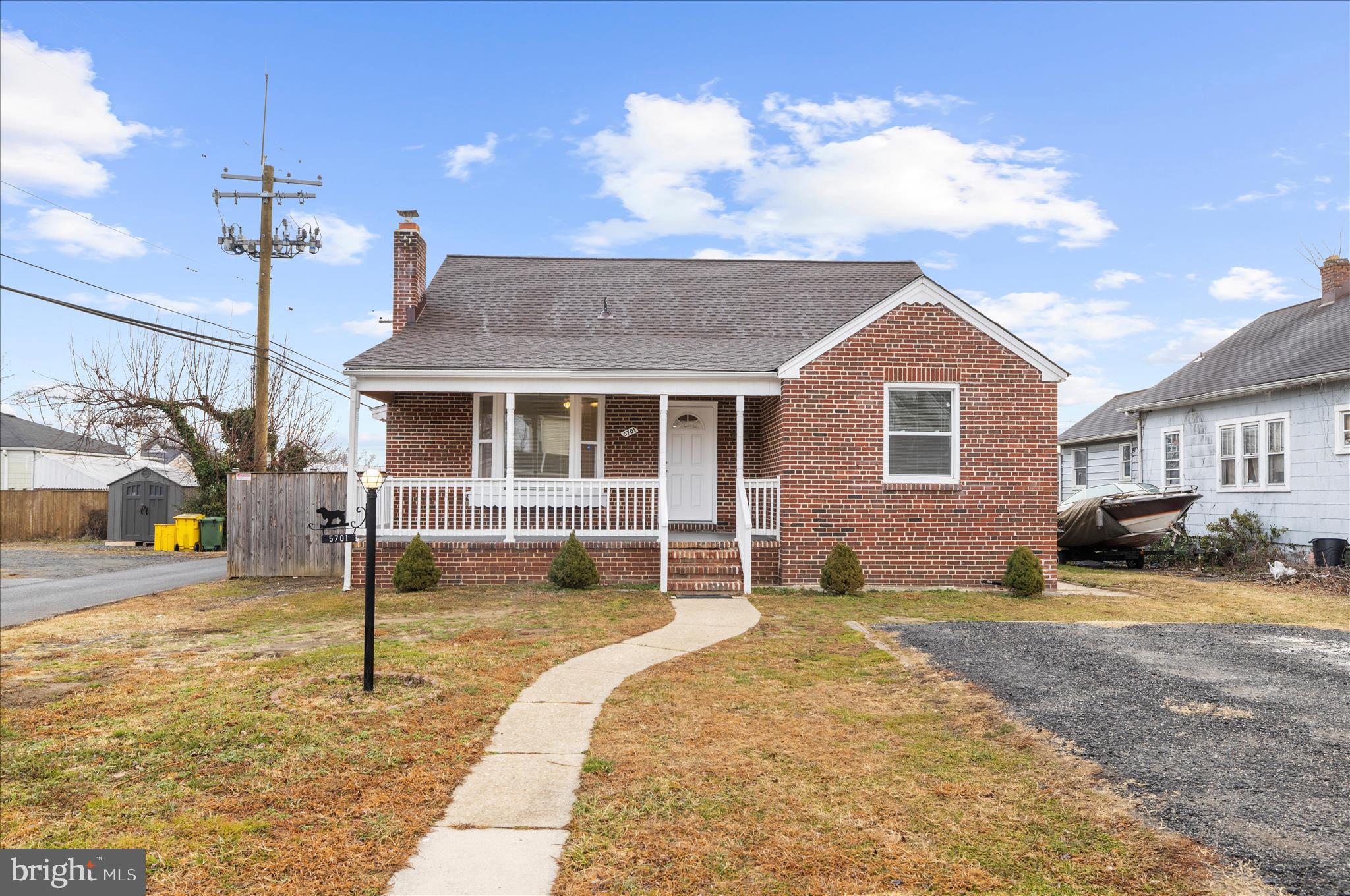 5701 Magie Street Baltimore, MD 21225 - Photo 1 of 49 a view of a house with swimming pool