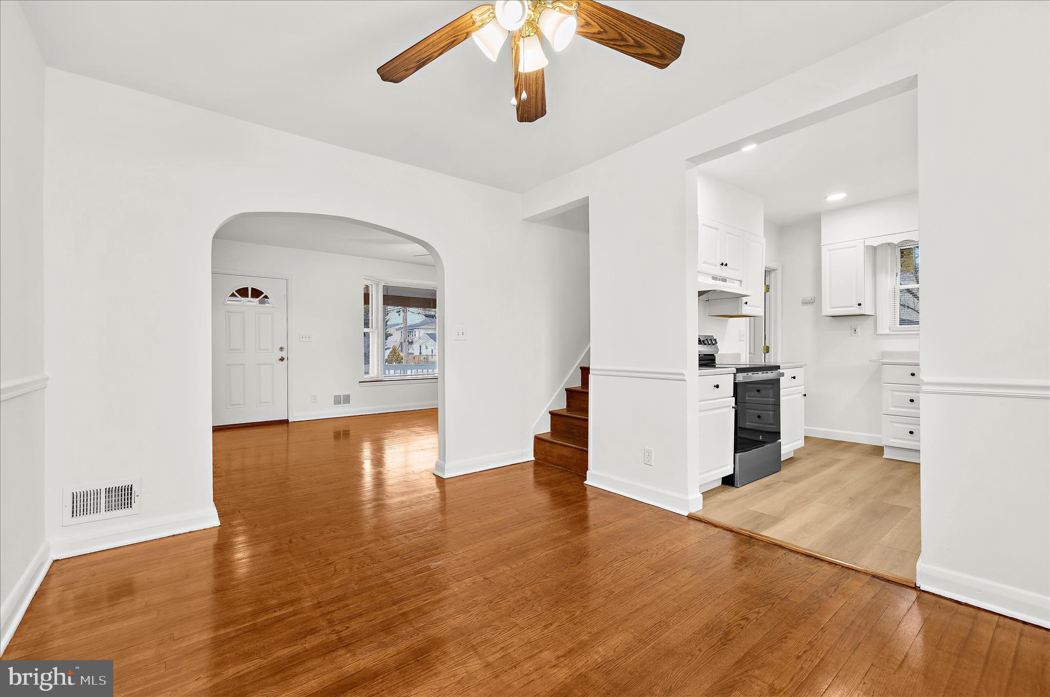 5701 Magie Street Baltimore, MD 21225 - Photo 19 of 49 a view of a livingroom with wooden floor