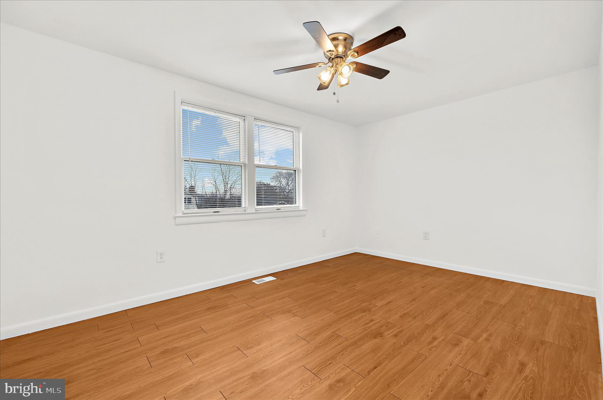 5701 Magie Street Baltimore, MD 21225 - Photo 22 of 49 an empty room with a window