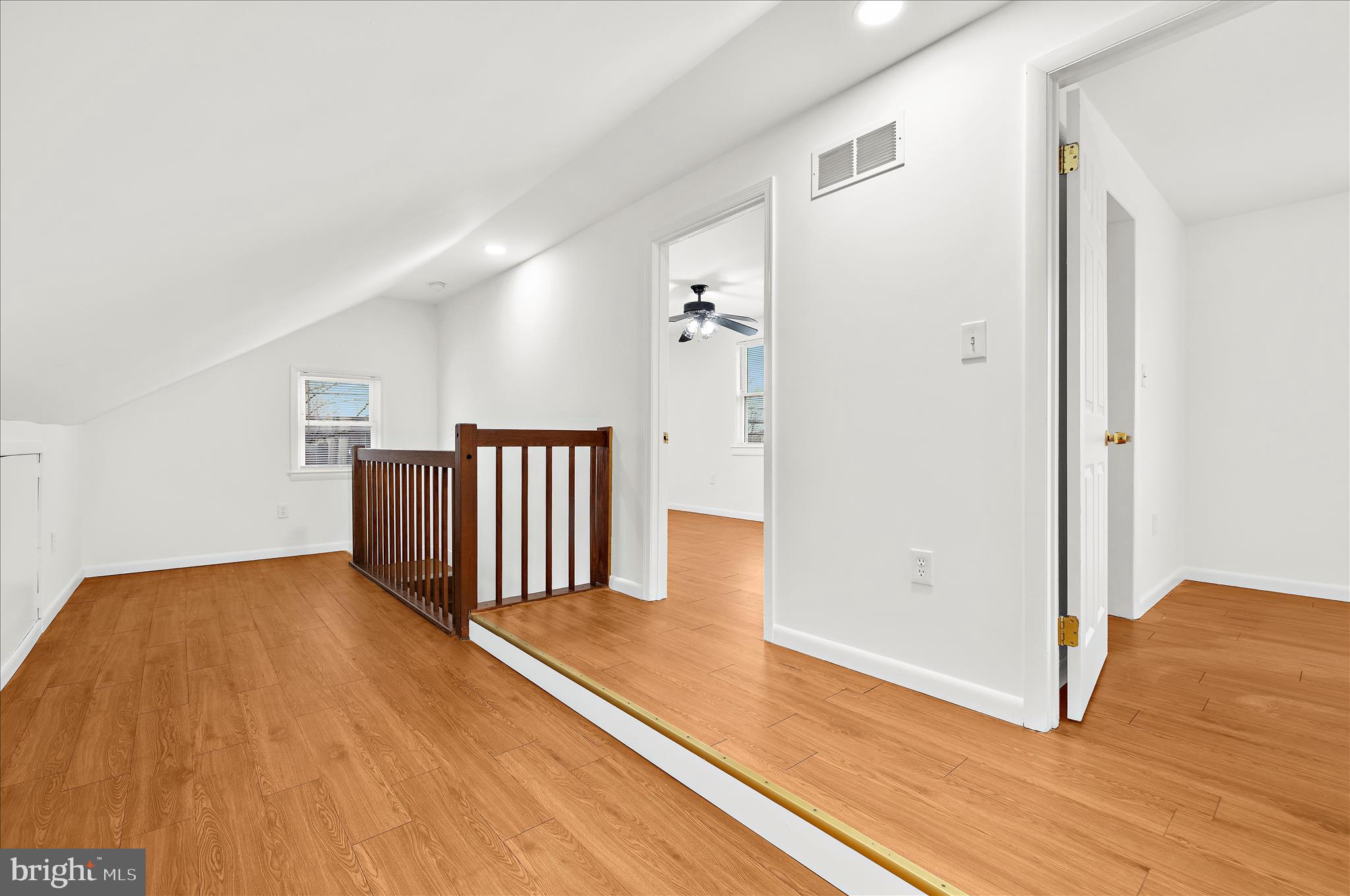 5701 Magie Street Baltimore, MD 21225 - Photo 25 of 49 a view of a livingroom with wooden floor
