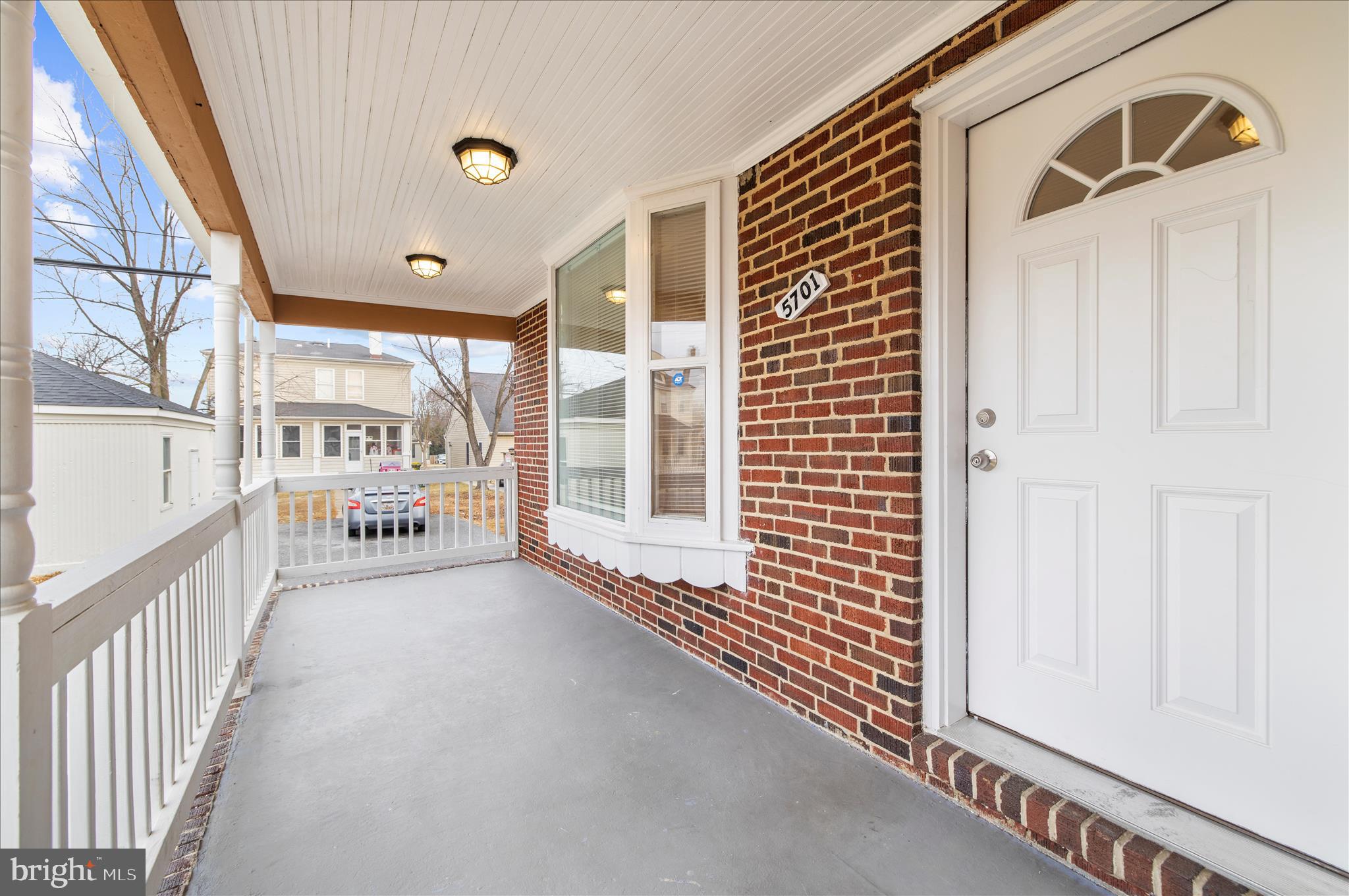 5701 Magie Street Baltimore, MD 21225 - Photo 4 of 49 a view of a hallway with windows
