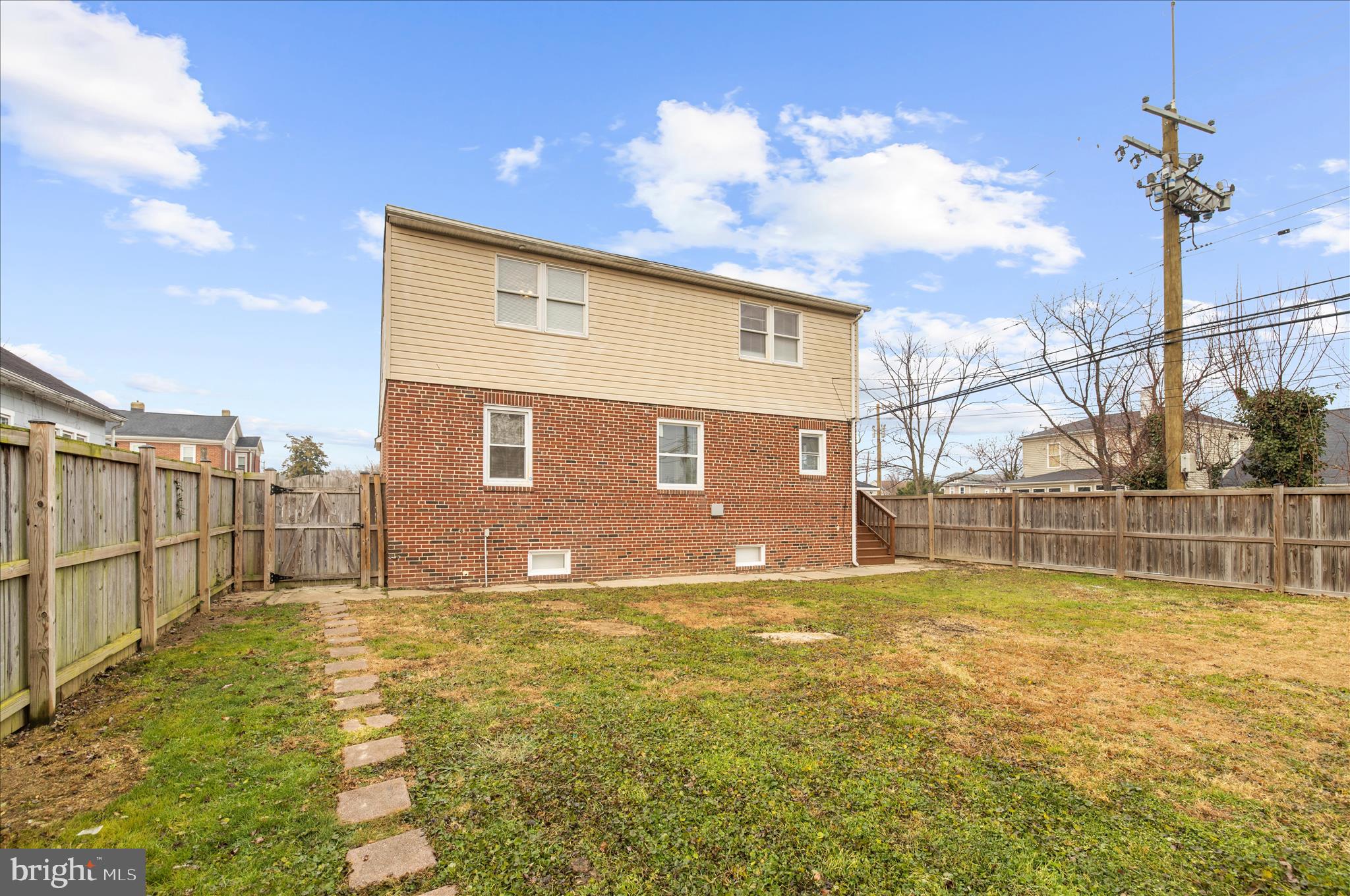 5701 Magie Street Baltimore, MD 21225 - Photo 48 of 49 a view of a house with a swimming pool