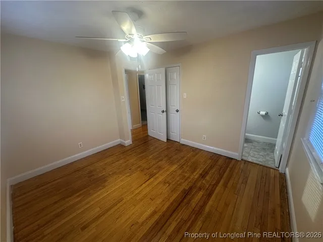 a view of a livingroom with wooden floor