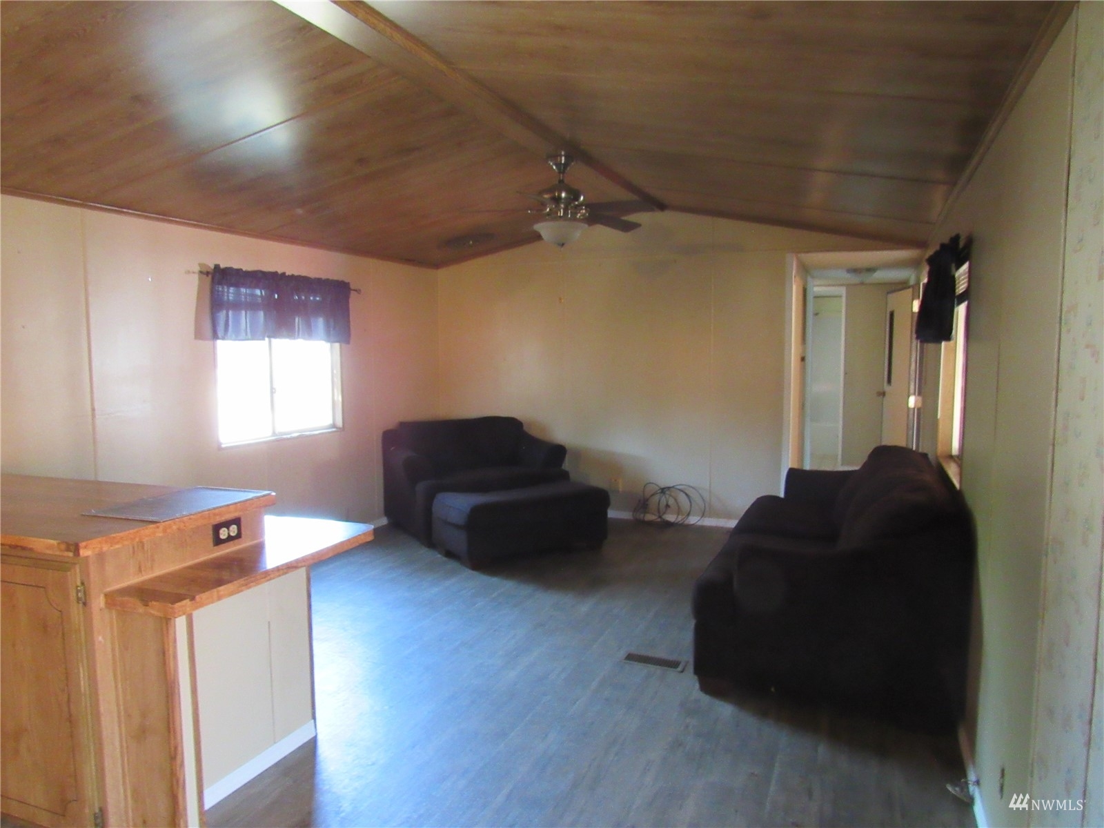 1121 Curtis Street, Unit 18 Sedro-Woolley, WA 98284 - Photo 5 of 20 a living room with furniture and a window