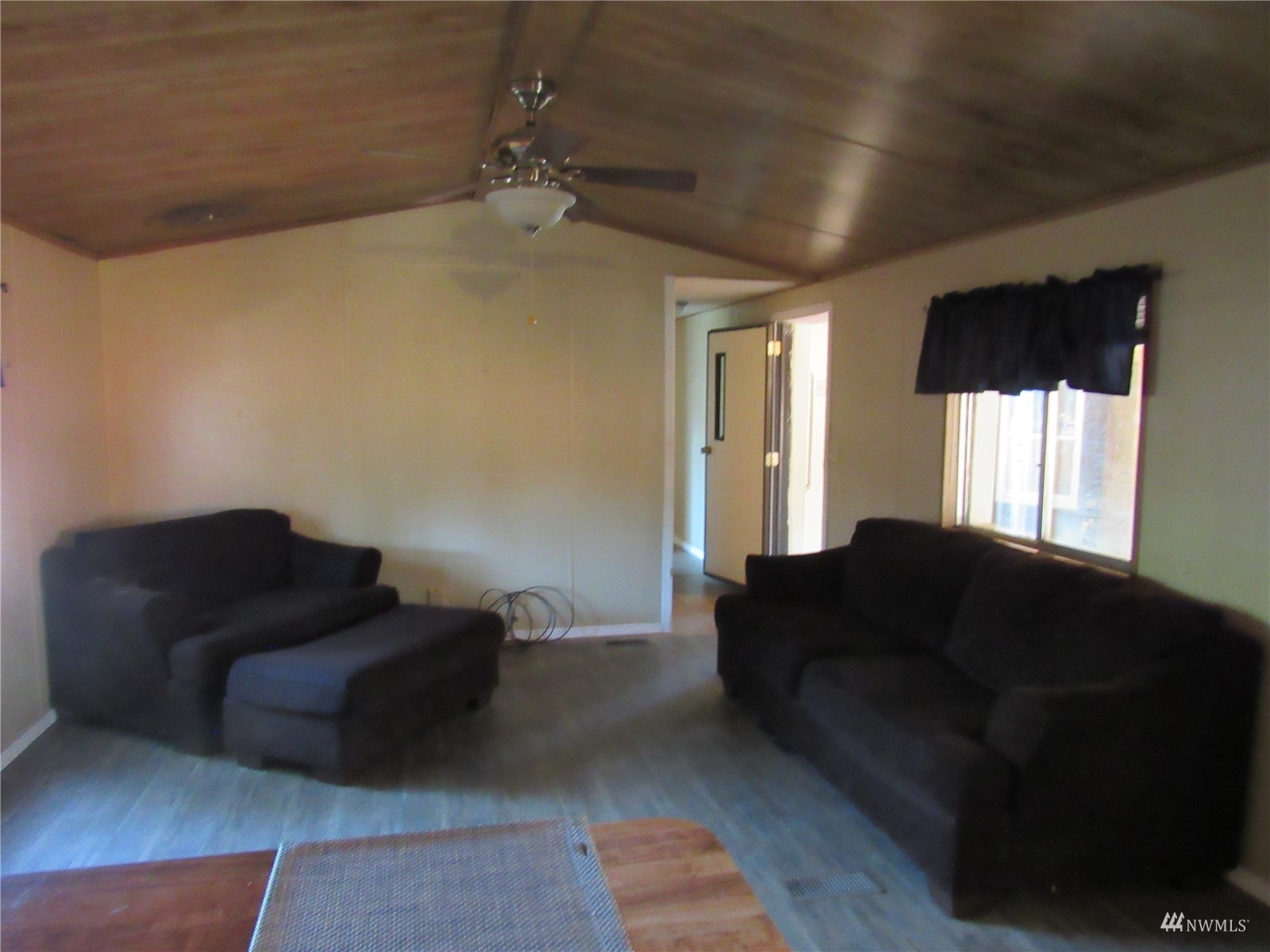 1121 Curtis Street, Unit 18 Sedro-Woolley, WA 98284 - Photo 8 of 20 a living room with furniture and a window