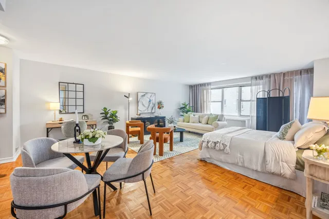 a living room with furniture and a window