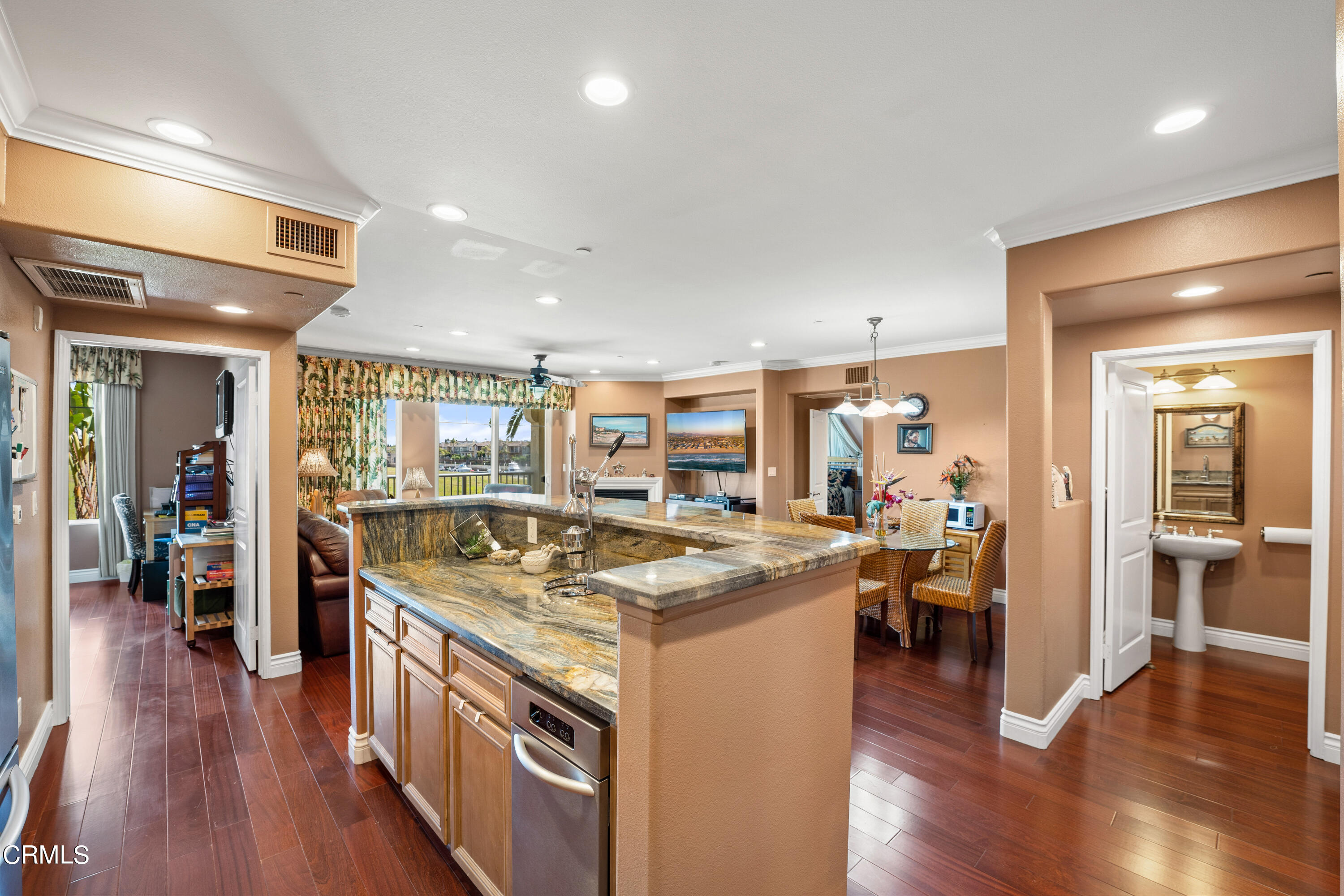 a open kitchen with stainless steel appliances granite countertop lots of counter top space