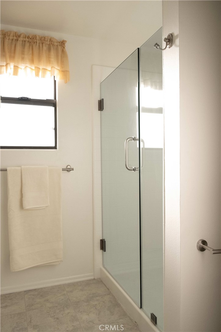 1739 Compromise Line Road Glendora, CA 91740 - Photo 17 of 29 a bathroom with a glass shower door