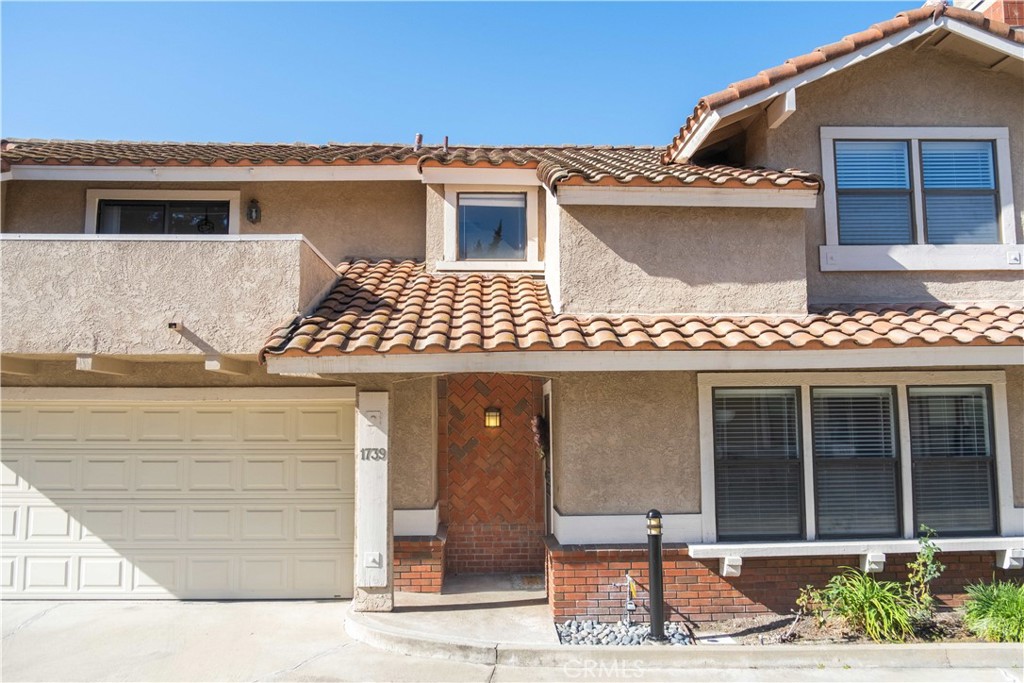 1739 Compromise Line Road Glendora, CA 91740 - Photo 2 of 29 a front view of a house with a garage