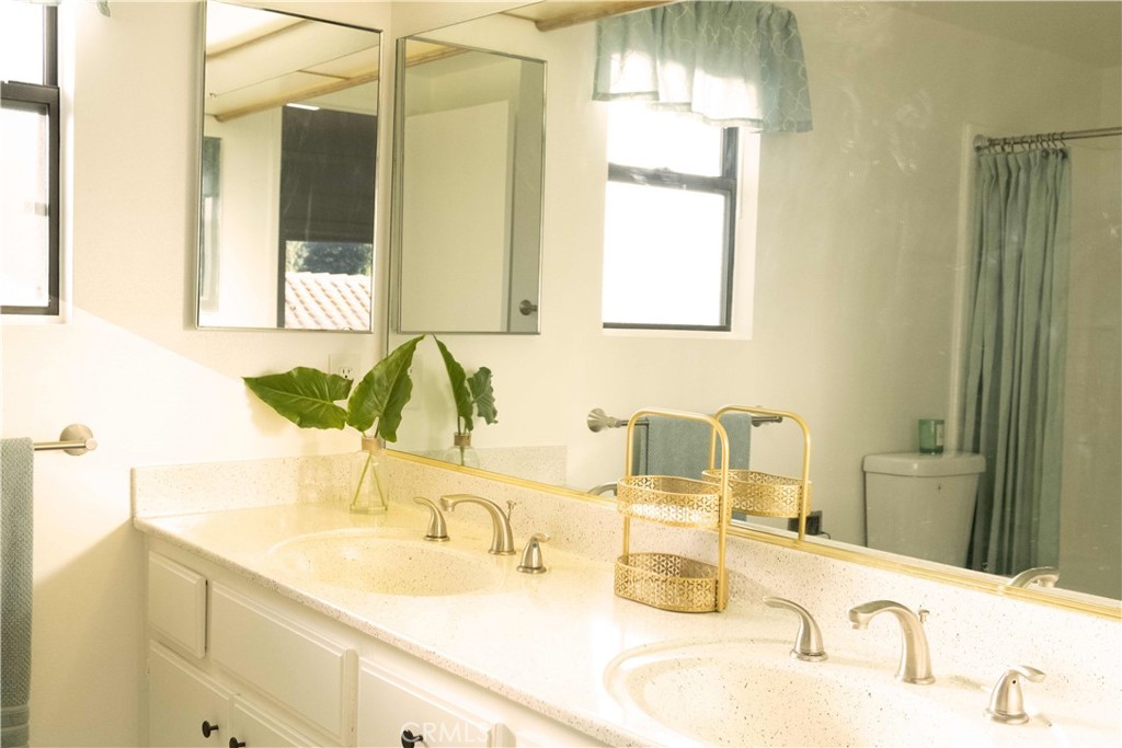 1739 Compromise Line Road Glendora, CA 91740 - Photo 25 of 29 a bathroom with a sink and a mirror