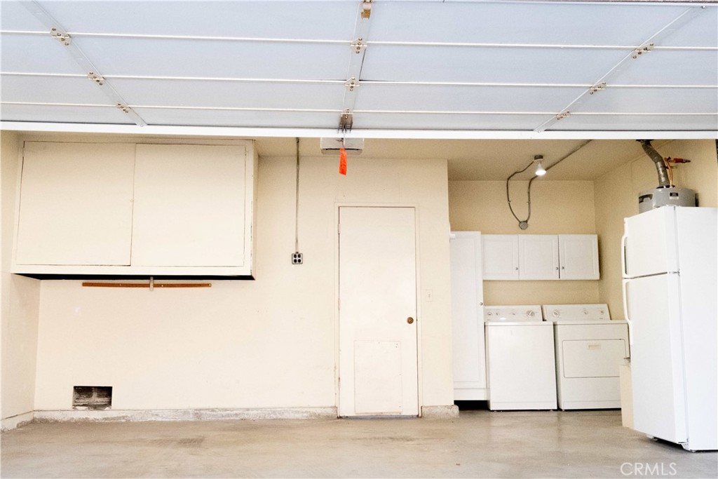 1739 Compromise Line Road Glendora, CA 91740 - Photo 26 of 29 a view of a refrigerator in kitchen and a window