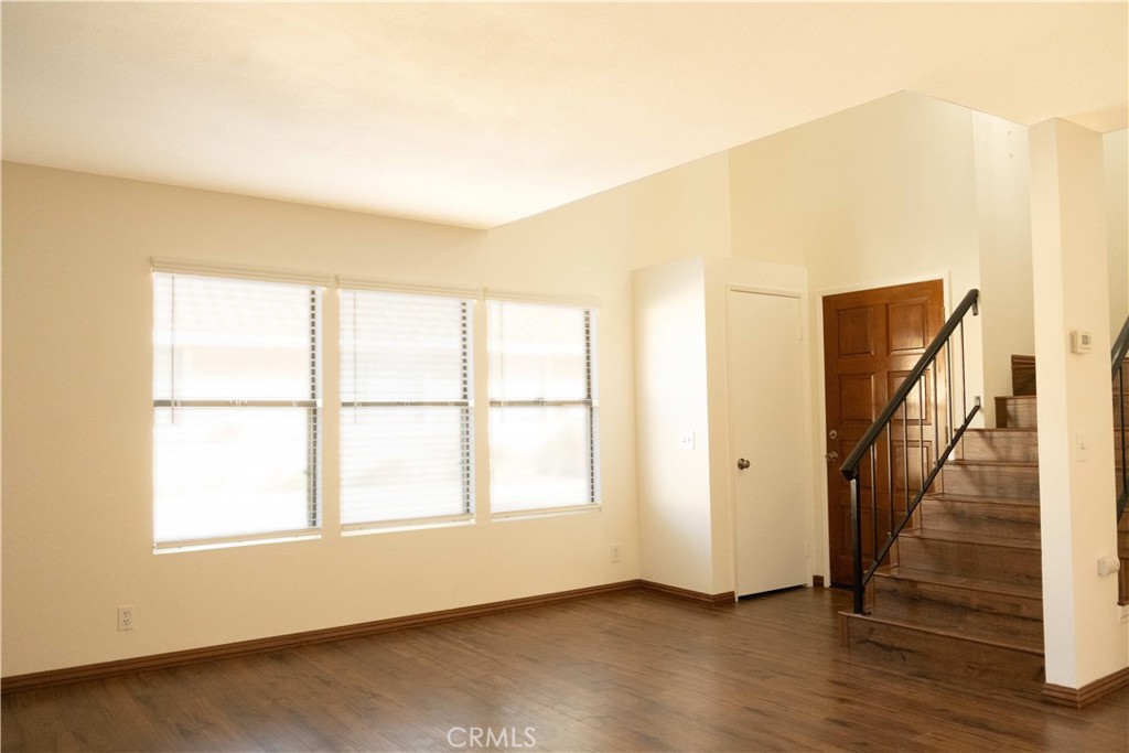 1739 Compromise Line Road Glendora, CA 91740 - Photo 3 of 29 a view of an empty room with wooden floor and a window