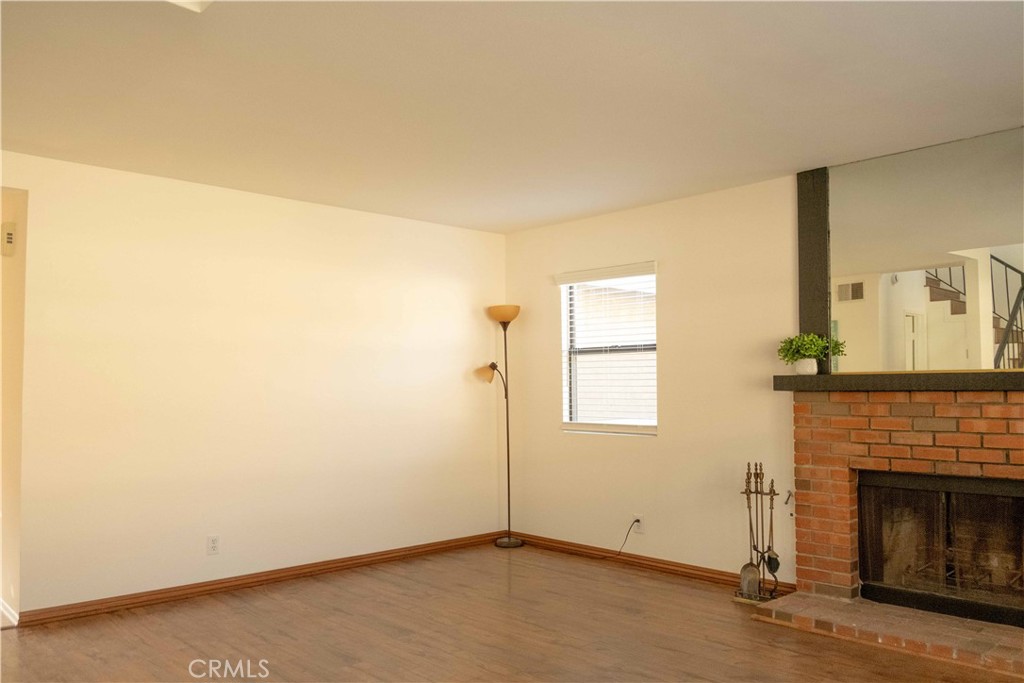 1739 Compromise Line Road Glendora, CA 91740 - Photo 4 of 29 a view of an empty room with a fireplace