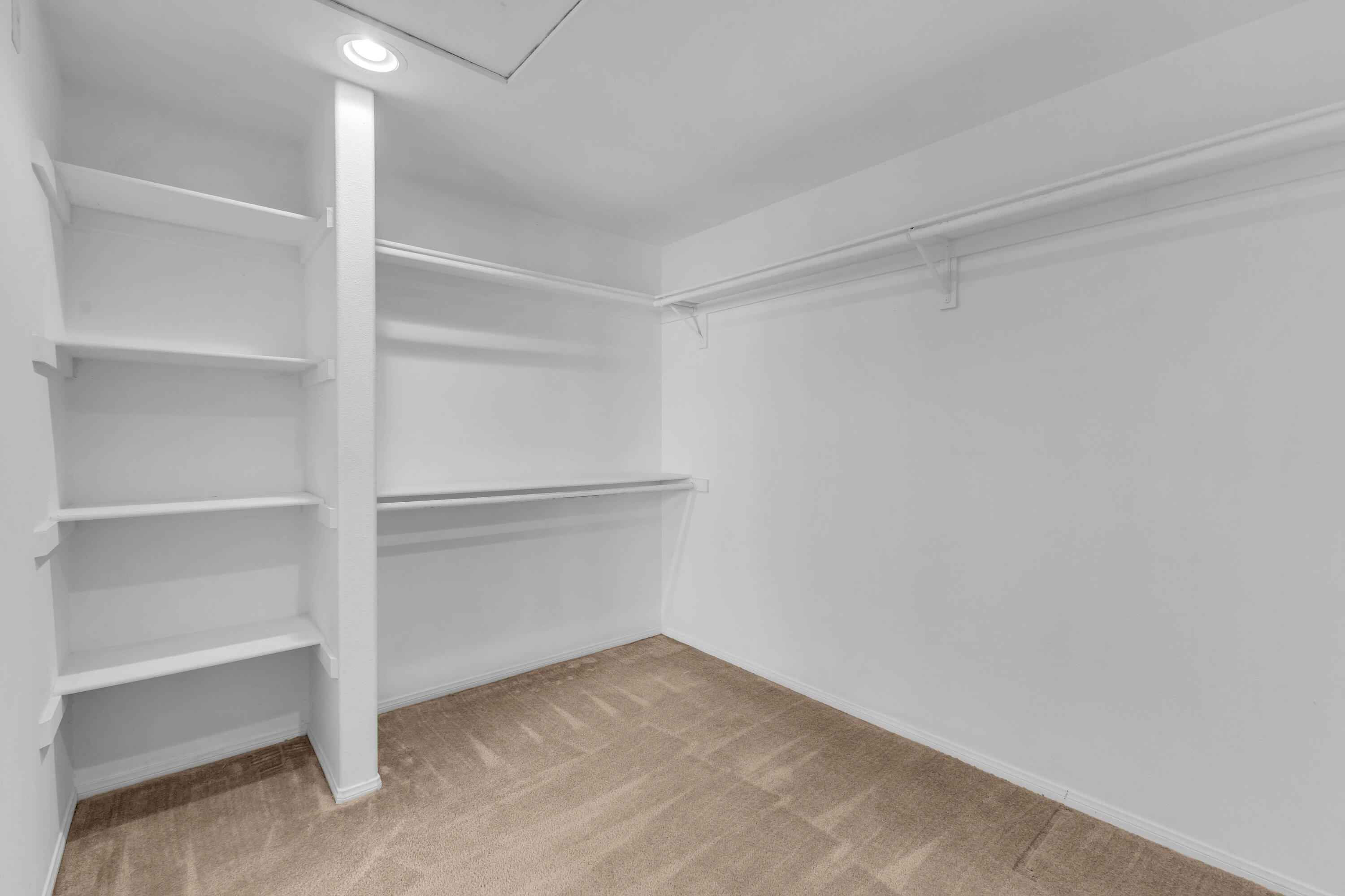 48690 Hepburn Drive Indio, CA 92201 - Photo 12 of 36 a view of an empty walk in closet