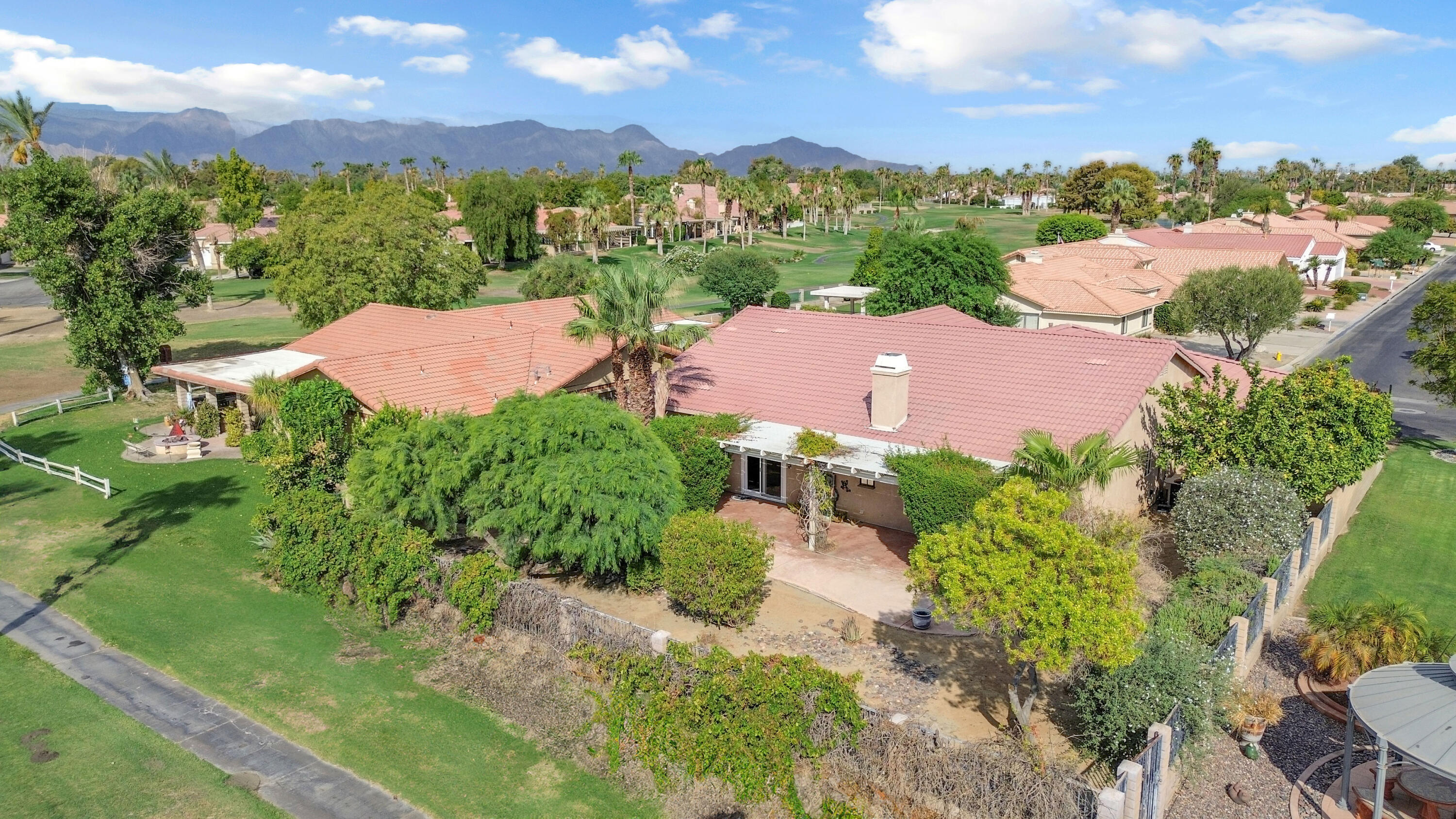 48690 Hepburn Drive Indio, CA 92201 - Photo 31 of 36 an aerial view of a houses with a yard