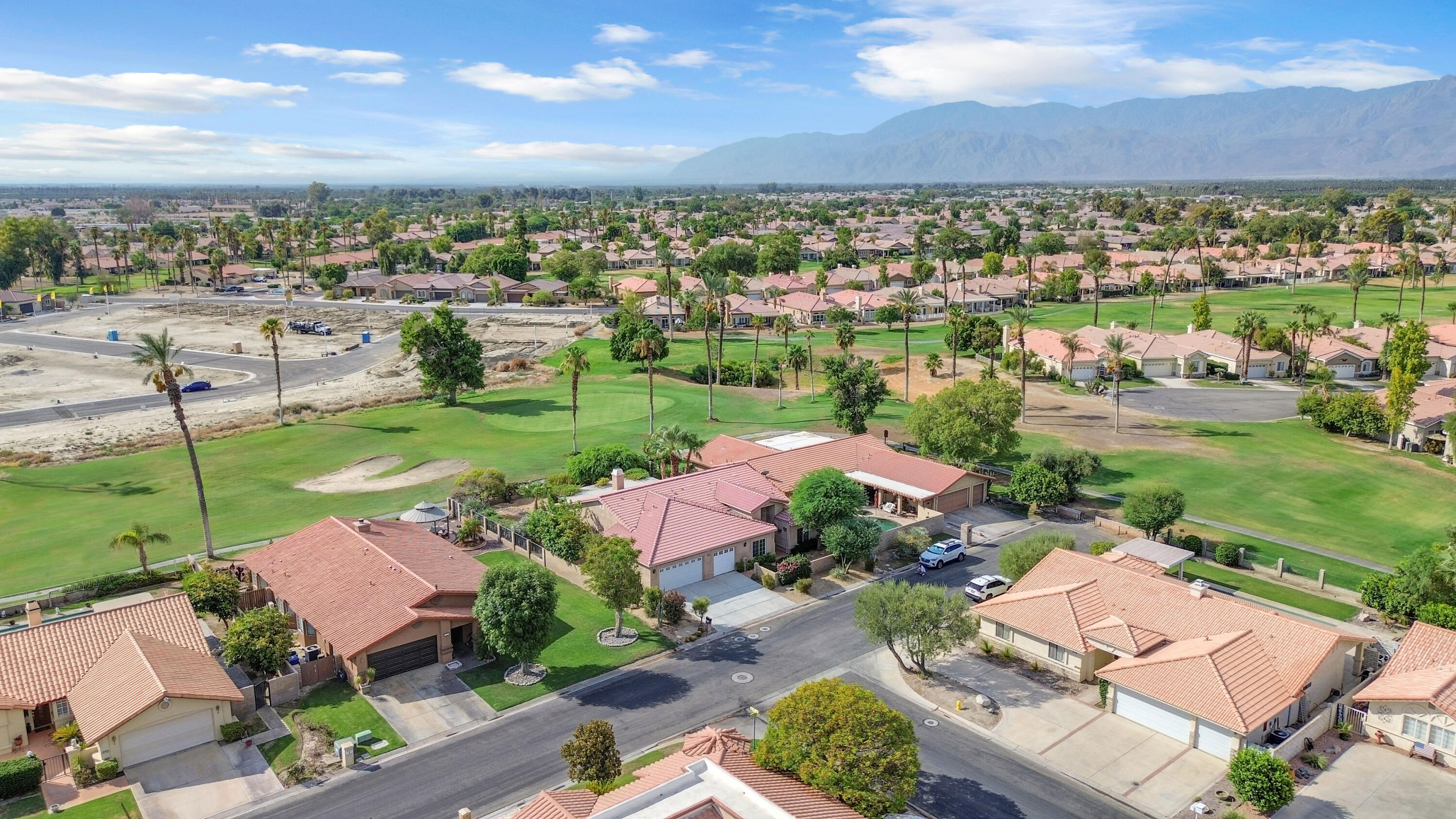 48690 Hepburn Drive Indio, CA 92201 - Photo 33 of 36 an aerial view of a residential houses with outdoor space and city view