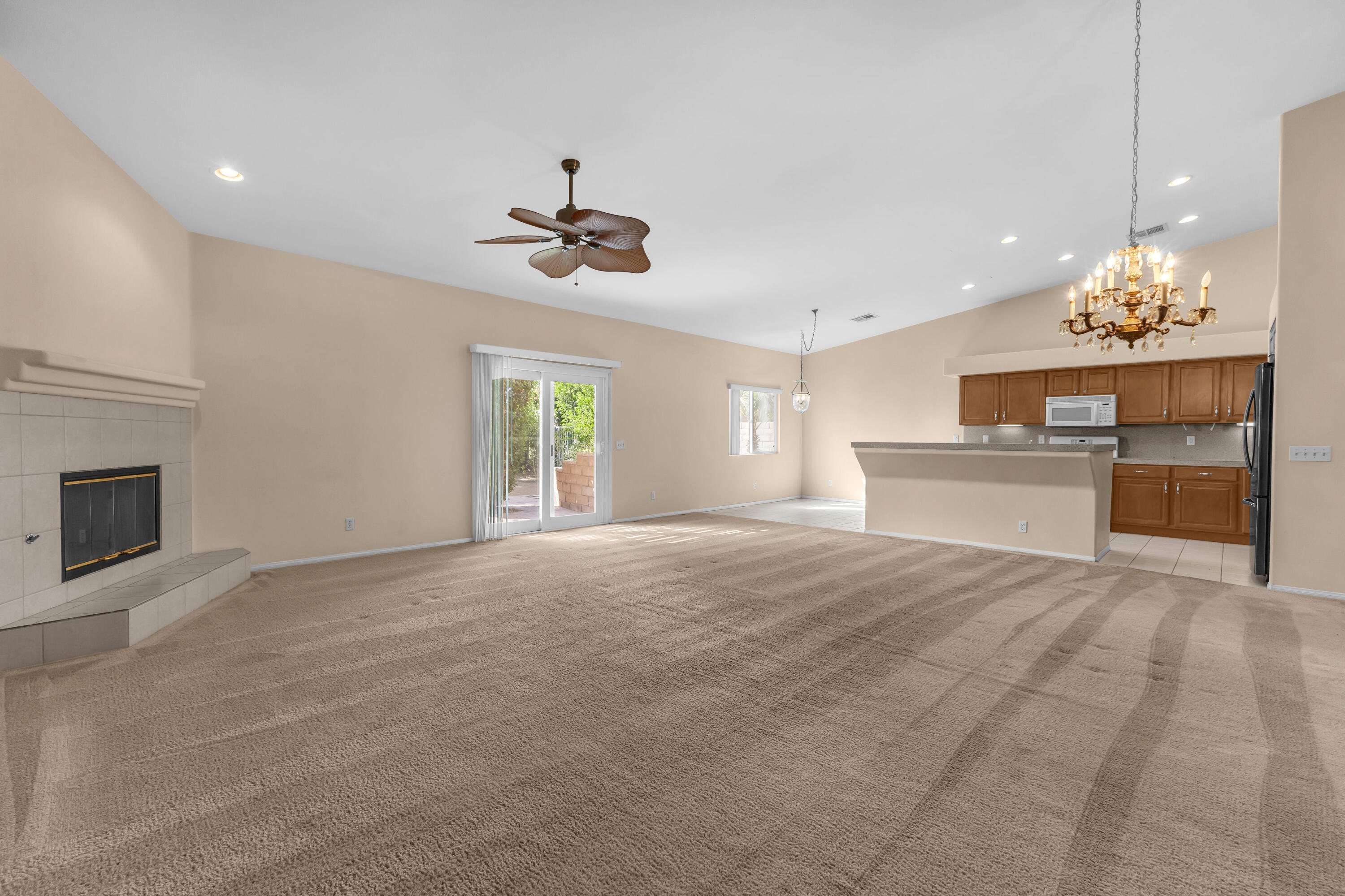 48690 Hepburn Drive Indio, CA 92201 - Photo 4 of 36 a view of a kitchen with a sink and dishwasher kitchen view
