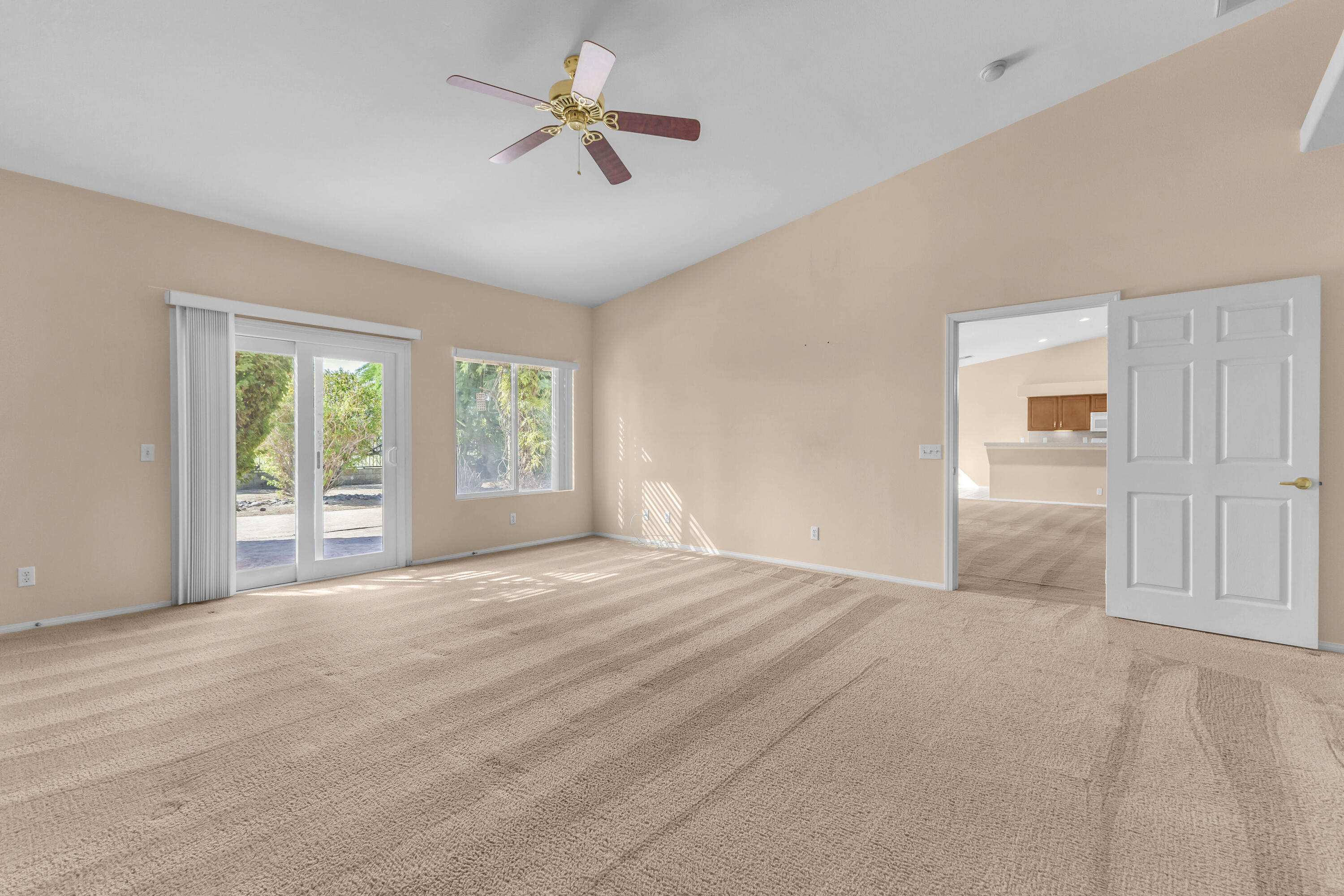 48690 Hepburn Drive Indio, CA 92201 - Photo 6 of 36 a view of an empty room with a window