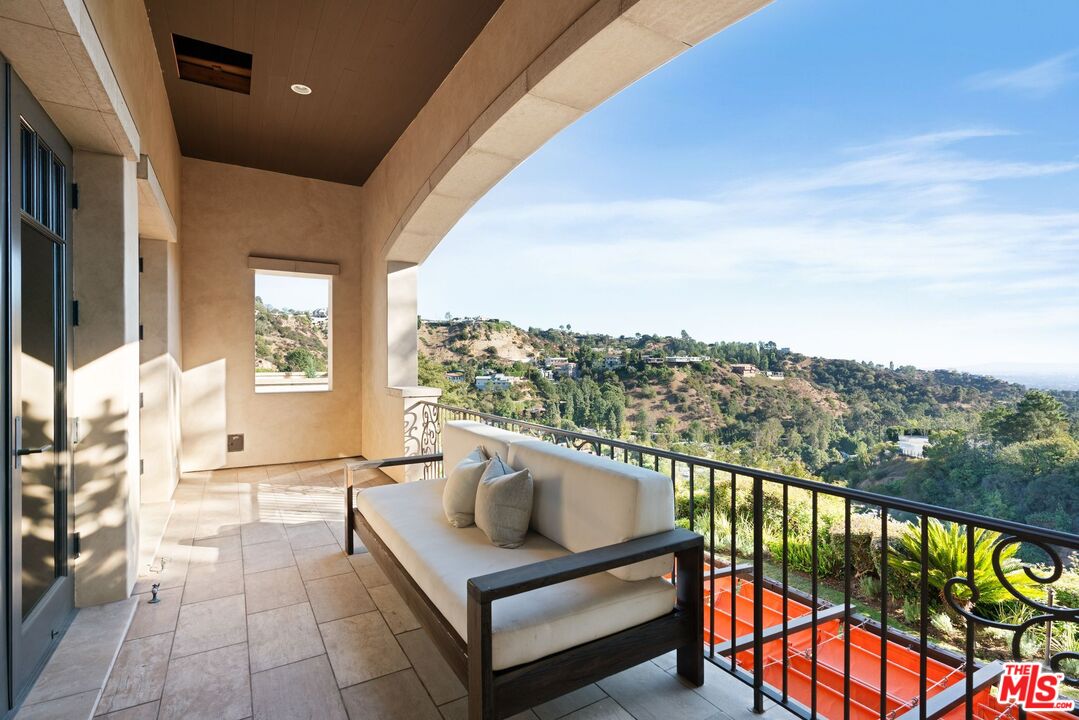 8 Beverly Ridge Terrace Beverly Hills, CA 90210 - Photo 47 of 74 a view of a balcony with furniture