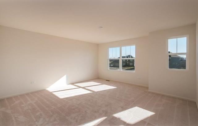 4331 Little Leaf Road Naperville, IL 60564 - Photo 12 of 39 a view of an empty room with a window