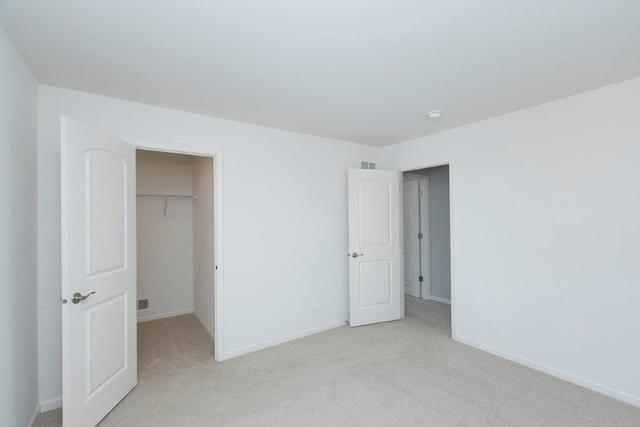 4331 Little Leaf Road Naperville, IL 60564 - Photo 26 of 39 a view of an empty room