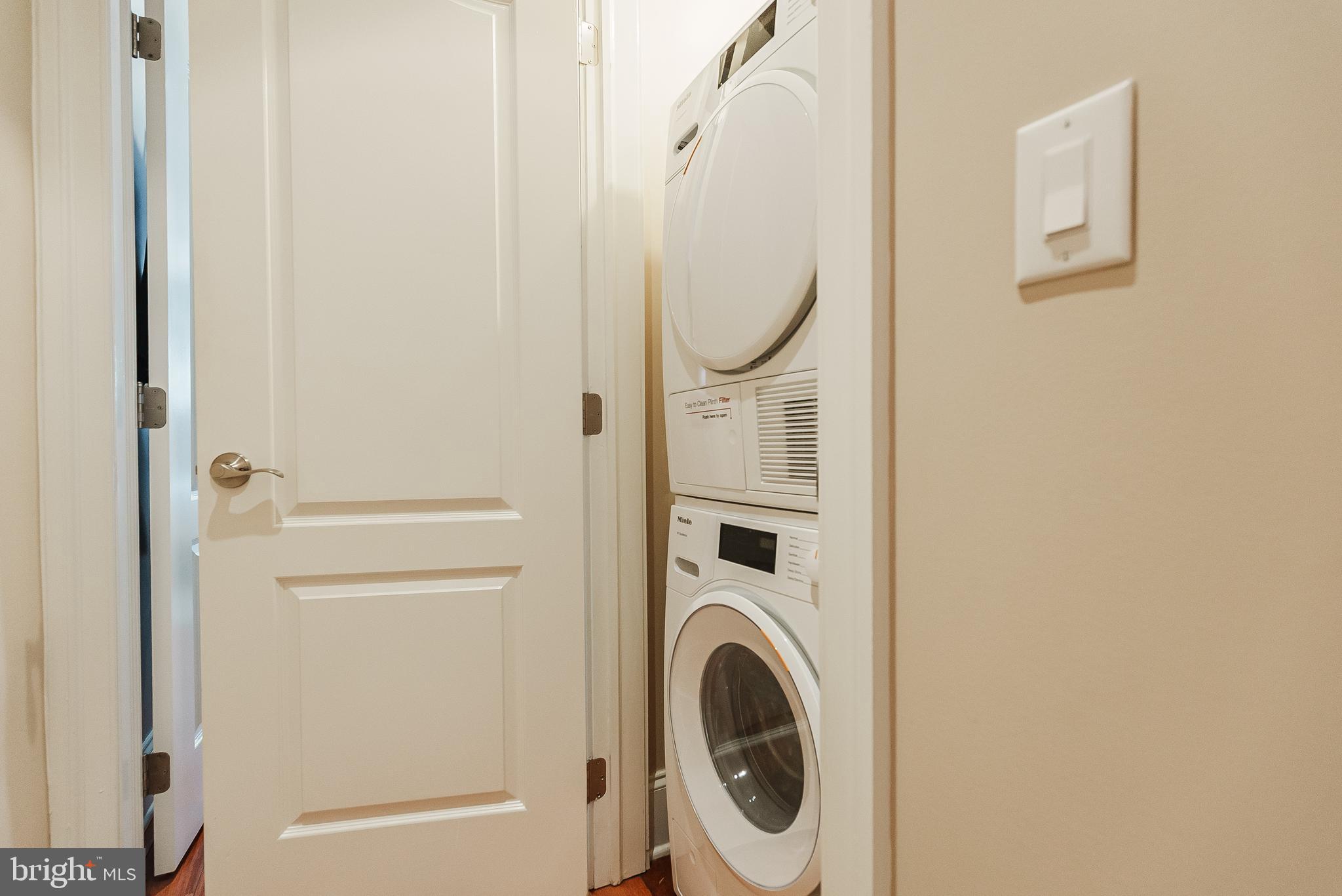 2049 Walnut Street, Unit 1R Philadelphia, PA 19103 - Photo 20 of 20 a utility room with dryer and washer