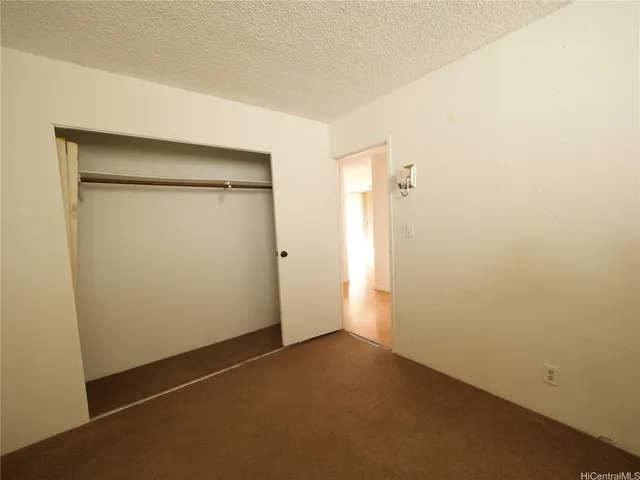 an empty room with closet