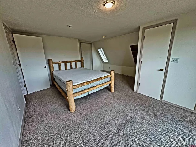 a picture of a bathroom with a shower