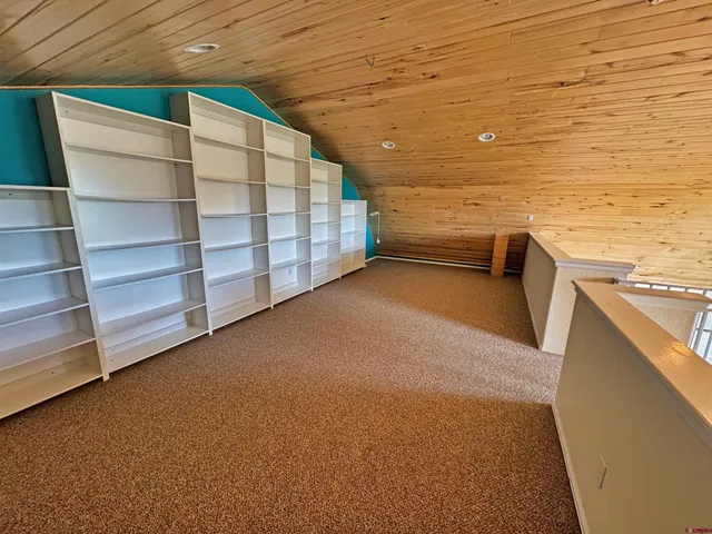 a bathroom with a tub and a sink