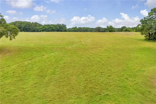 a view of a lake with a city